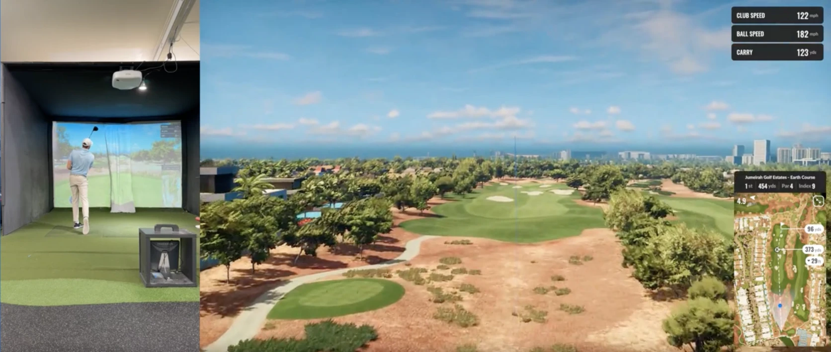 Golfer using an indoor simulator to play on a virtual golf course, with a large screen displaying a sunny golf course and player stats.